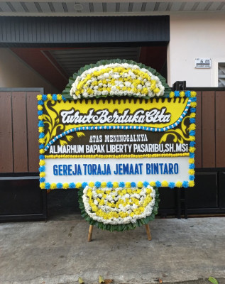 Papan Bunga Duka di Hutumury